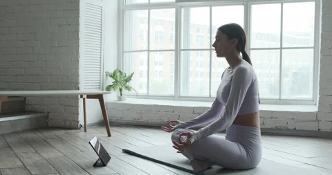 Professional yoga practitioner lady in grey sports suit Video stock 156588093