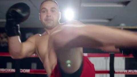 Professional young boxer in the ring, practice the technique of strikes, rack Video stock 155638912