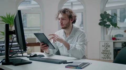 Professional Young Programmer Check Website Design on Tablet. Working at Home. 스톡 동영상 130824399