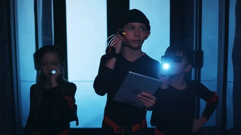 Professional young team of secret agents sneaking into data center storage Stock Footage 120697754