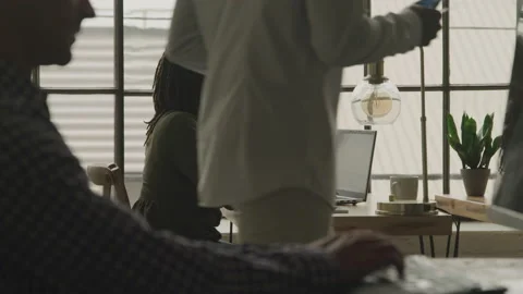 Professionals Work While Executive Passes By Video stock 208777912