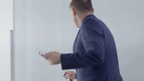 Professor asking for students' opinion in a classroom Stock Footage 69931645