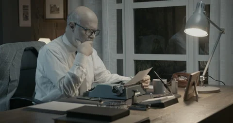 Professor checking his work in the office Stock Footage 151174909