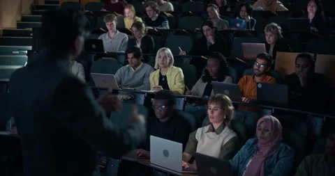 Professor Reading Lecture to Audience Stock Footage 326422584