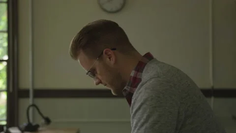 Professor Sits In Deep Thought Processing Stock Footage 208724536