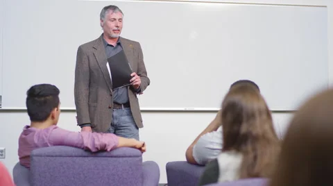 A professor speaks to his class Stock Footage 55110293