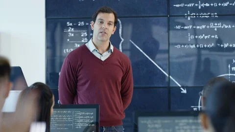 Professor training engineer university student on physics at lecture Video stock 106676244