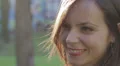 profile of beautiful woman that is smiling - wellness - happiness - laugh HD Footage