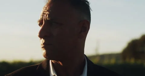 Profile closeup of caucasian man looking off into distance. Stock Footage 206548716