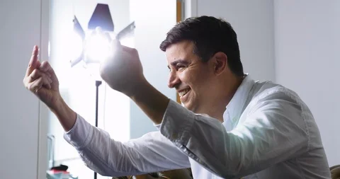 Profile of Dark Haired Man Giving the Middle Fingers and Smiling Stock Footage 120437104
