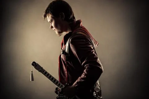 Profile face man with sword Stock Photos