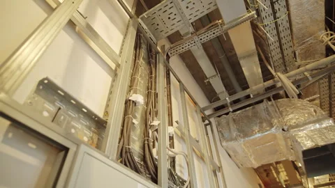 Profile frames and exposed ceiling ventilation line corridor Stock Footage 335644419