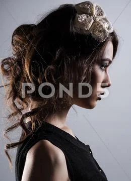 Profile of gorgeous young lady Stock Photos