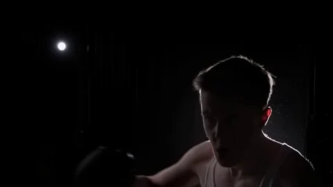Profile of kickboxer technique of boxing strikes Video stock 82627172