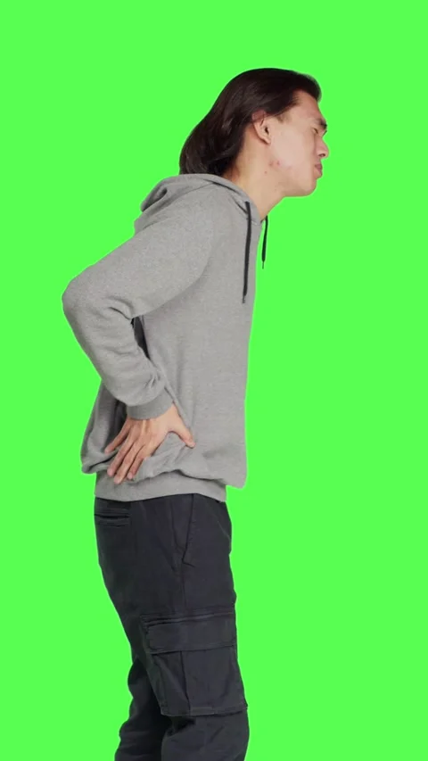 Profile of male model suffering from back pain Stock Footage 255246064