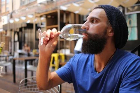 Profile of a man drinking wine Stock Photos