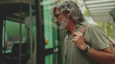 Profile of middle-aged man with gray hair and beard, wearing casual clothes, 스톡 동영상 226429284