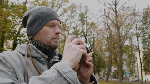 Profile of a middle-aged man with retro photo camera. Stock Footage 129352337