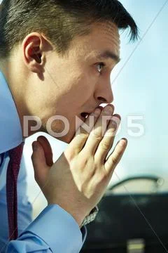 Profile of serious man concentrating on thoughts Stock Photos