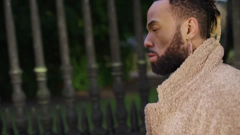 Profile shot of young man walking on the street one morning, in slow motion Stock-Footage 168167348