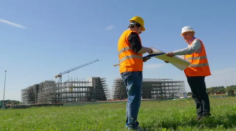 Profile of site manager cheking with project the work Video stock 63092024