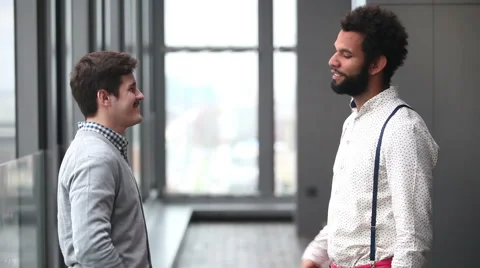 Profile of two advertising executives shaking hands Stock Footage 59543468