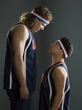 Profile of two young men looking at each other Foto stock