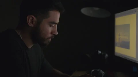 Profile of a Video Editor Working at a D... | Stock Video | Pond5