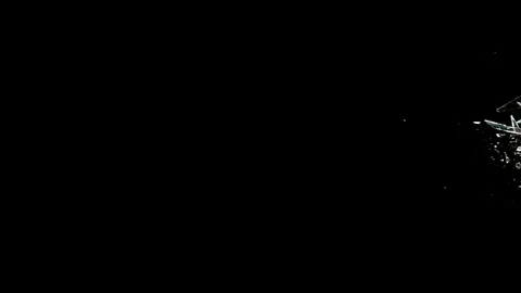 Profile view of Glass breaking in slow motion on black background Stock Footage 126212992