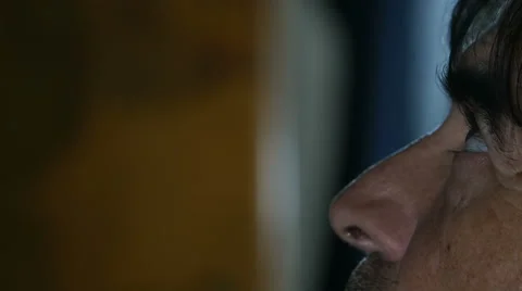 Profile view of a grizzled man looking up to the ceiling 스톡 동영상 59936731