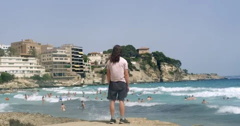 Profile of Young Man at Palma Beach Sea side Shore on Sunny Day. Holiday Hipster Stock Footage 94334608