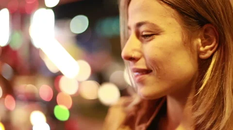 Profile of young woman in amusement park Stock Footage 59556280