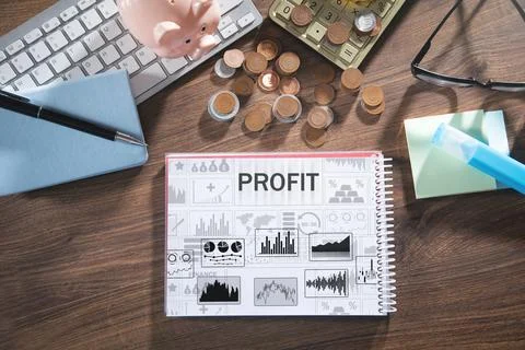 Profit concept in notepad with a business objects. Stock Photos