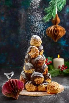 Profiterole cake with custard. Stock Photos