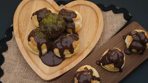Profiterole dessert rotate Stock Footage 260163361