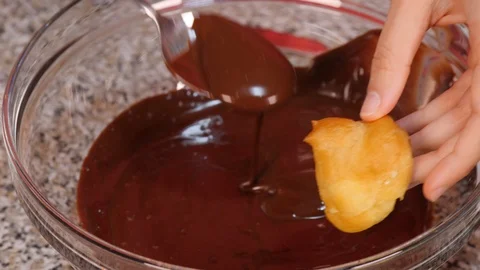 Profiteroles with chocolate glaze Stock Footage 97974763