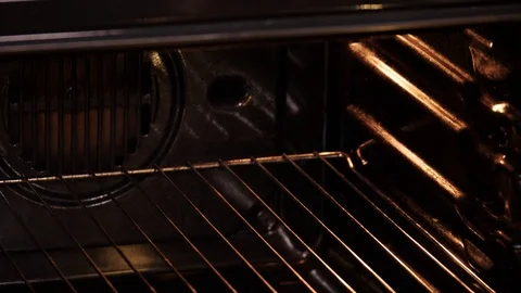 Profiteroles in the oven Stock Footage 97974164