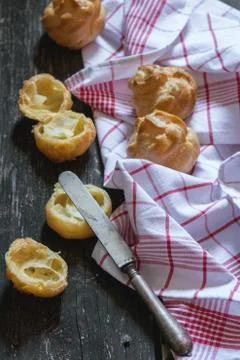 Profiteroles ready to stuff Stock Photos