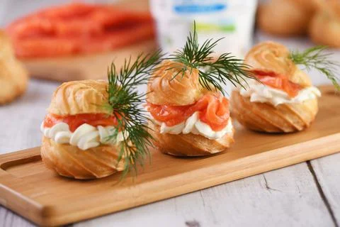 Profiteroles with salmon Stock Photos