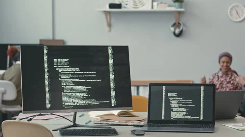 Program Code on Black Screens at Office Desk of Software Developer Stock Footage 241266413
