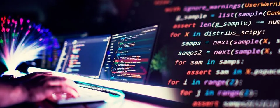 Program code on a computer monitor with fiber optic background. Internet an.. Stock Photos