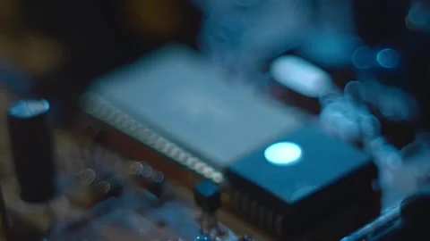 Program code on a microchip, symbolizing the operation of an electronic device Stock Footage 313150379