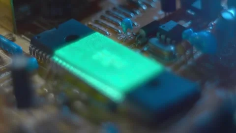 Program code on a microchip, symbolizing the operation of an electronic device Stock Footage 313156808