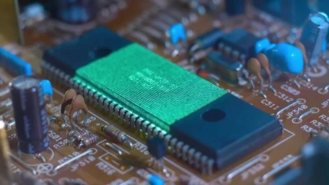 Program code on a microchip, symbolizing the operation of an electronic device Stock Footage 313179166