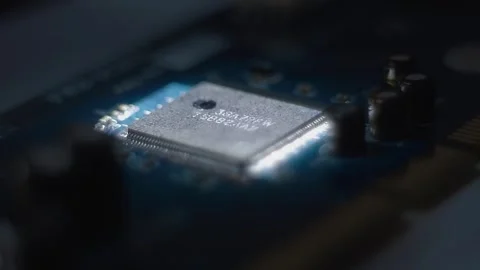 Program code on a microchip, symbolizing the operation of an electronic device Stock Footage 313228968