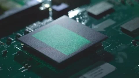 Program code on a microchip, symbolizing the operation of an electronic device Stock Footage 313229762