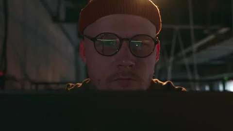 The program code is reflected in the glasses of the male developer Stock Footage 258967295