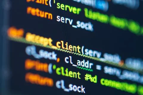 Program code on screen of laptop. Coding process. Software development. Devel Stockfoto's