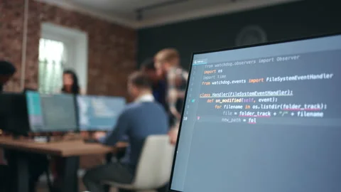 Program code writing on display of computer in office, data scientist and Stock Footage 233730636