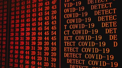 Program COVID-19 DETECTED red text on PC screen Stock Footage 129629054